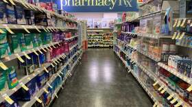 Merchandise aisle and Pharmacy Sign at Walgreens, Queens, New York. (Photo by: Lindsey Nicholson/UCG/Universal Images Group via Getty Images)