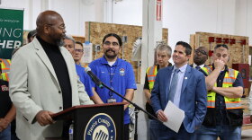 Pierce County has given Clover Park Technical College a $300,000 grant. Lester Burkes, the college’s dean of Automotive and Trades, at left, addresses a crowd at the college’s Eastside Training Center, with Pierce County Executive Ryan Mello, at right, looking on.
