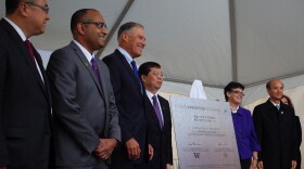 Celebrating the GIX groundbreaking: Tsinghua University VP Yang Bin, UW VP of Innovation Strategy Vikram Jandhyala, Governor Jay Inslee, Tsinghua President Qiu Yong, UW President Ana Mari Cauce and Consul General Luo Linquan            
