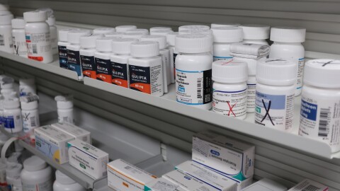 FILE — Bottles of medications sit on shelves at the Stormont Vail Retail Pharmacy in Topeka, Kan., June 2, 2026.