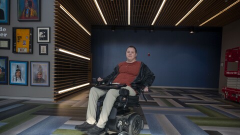 Erica Carter lives in Sioux City and works as a finance manager at the Omaha Nation School District in Nebraska. She lost her Medicaid benefits more than two years ago after the state determined her income was too high. She opted to pay for expenses that aren't covered by her employer-sponsored insurance like wheelchair repairs and home health aides out of pocket rather than quit her job.