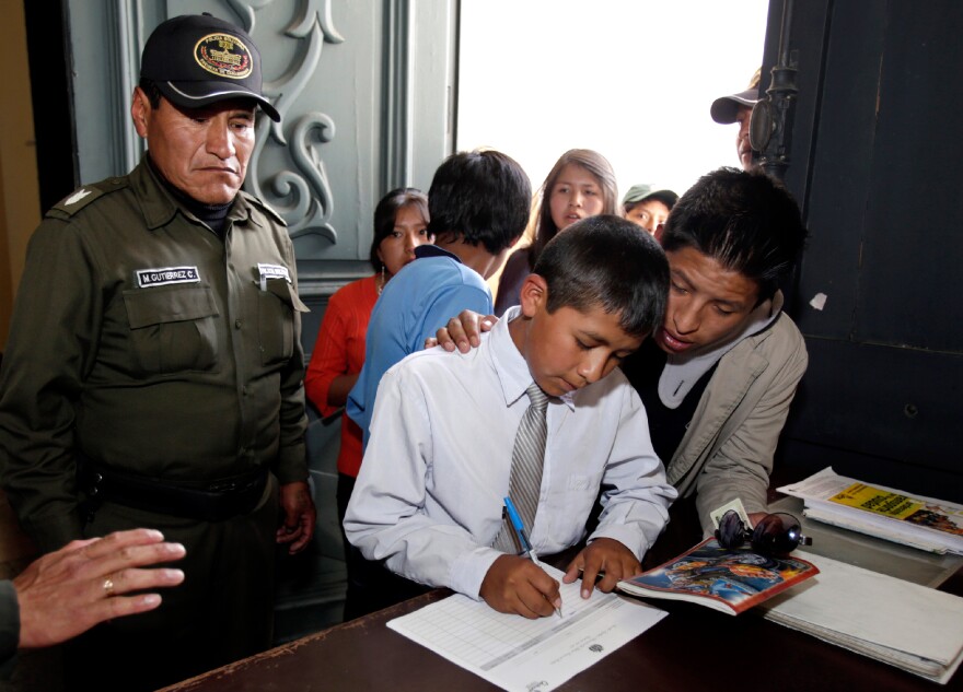Carlos Cachari Ticona, 12, works with child laborers. He is among the adolescent workers who support the new law that allows kids as young as 10 to work.
