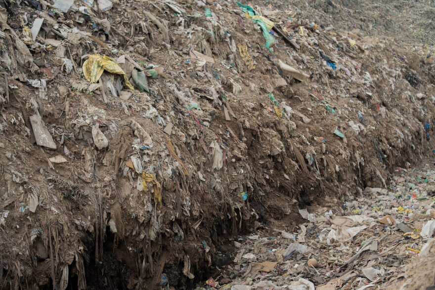 Trucks have bulldozed a switchback road up the Ghazipur landfill, which now towers almost as tall as the Taj Mahal.