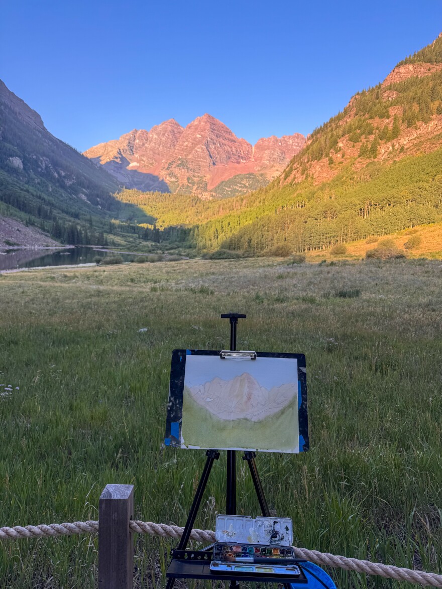 Jamie Wall headed to the Maroon Bells early Thursday morning to paint the peaks at sunrise.
