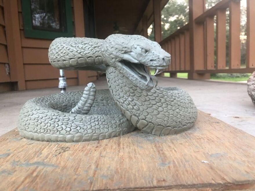 Pictures of the sculpting process taken to create the Rattler bronze.