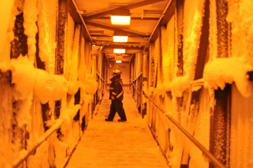 A ConocoPhillips worker at one of the company’s North Slope facilities last winter. (Photo by Elizabeth Harball/Alaska’s Energy Desk.)