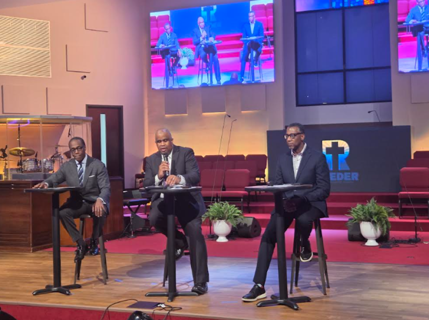 Frank Emory, David Howard and Mark Jerrell spoke at a transit forum Monday.