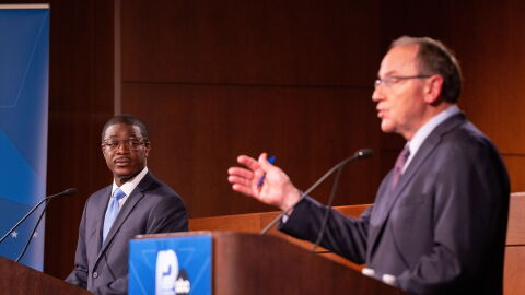 Wisconsin Democratic gubernatorial nominee David Crowley, left, listens as Wisconsin Republican gubernatorial nominee Tom Tiffany speaks during a debate at Marquette University Law School, Wednesday, Oct. 21, 2026, in Milwaukee. (AP Photo/Lizzy Larson)