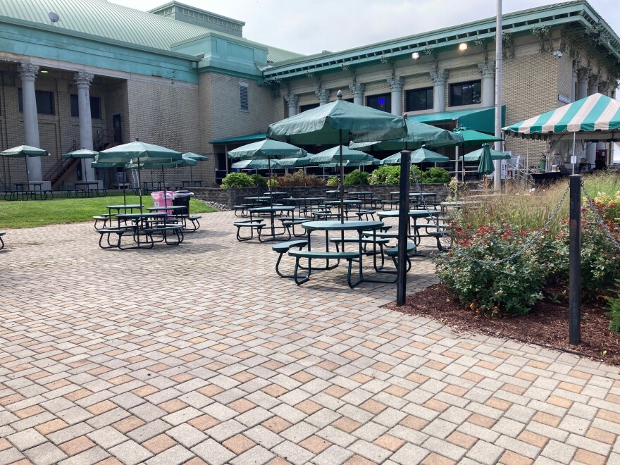 These tables sat empty outside the Center of Progress Building.