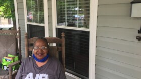 Mattie Marshall sits on her porch one block away from where the Charlotte protests first erupted about one month ago.