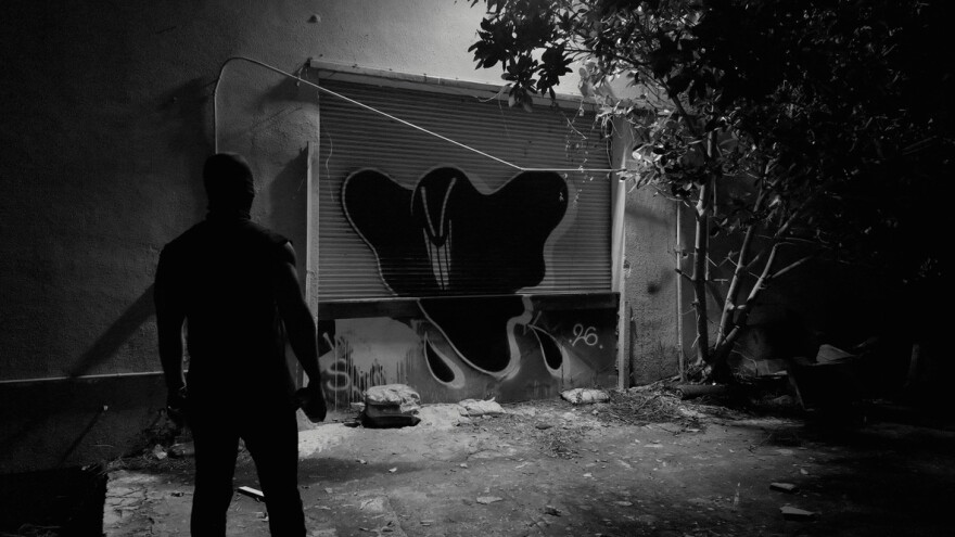 Miami-based artist AES (“The Miracle Ghost”) paints one of his signature ghost figures during a graffiti mission. For AES, street painting remains inseparable from his studio practice, with every work in “Partners in Crime” drawing on decades of shared experiences, camaraderie, and Miami’s evolving graffiti culture.