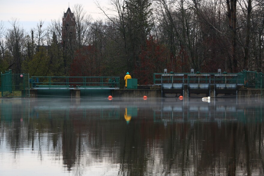 Dam operator Leslie Meyers monitoring water levels at the Bellaire Dam. (Photo : Austin Rowlader/IPR News)
