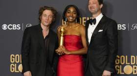 Jeremy Allen White, from left, Ayo Edebiri, and Ebon Moss-Bachrach pose in the press room with the award for best television series, musical or comedy for "The Bear" at the 81st Golden Globe Awards. (Chris Pizzello/AP)