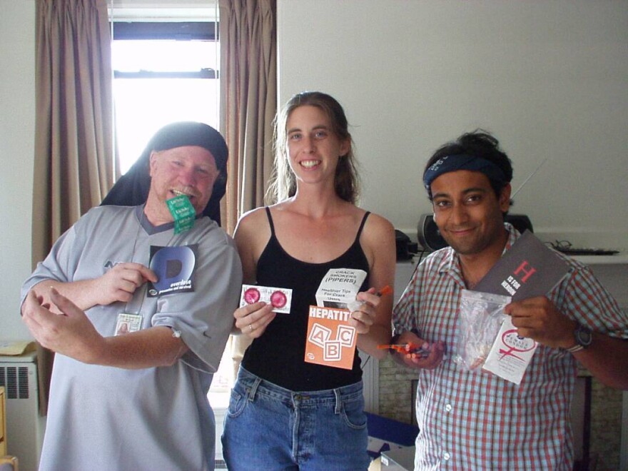 (L-R) Anthony (Tony) Givens, Alison Phinney and Nabarun Dasgupta pose with harm reduction supplies to hand out to people who use drugs in Portland, Maine, in 2002. Givens died of an overdose two years later.
