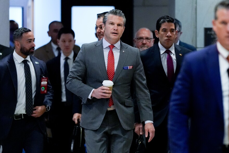 Defense Secretary Pete Hegseth arrives to brief members of Congress on military strikes near Venezuela, Tuesday, Dec. 16, 2025, at the Capitol in Washington.