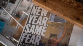 A newspaper with a headline stating "NEW YEAR, SAME FEAR" is displayed on Jan. 2, 2021 in Rehoboth Beach, Delaware. (Mark Makela/Getty Images)