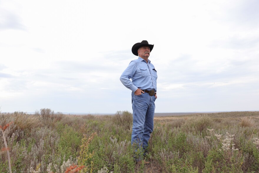 Mark Gardiner stands atop the "high and lonesome" hill on Gardiner Angus Ranch in Ashland, Kansas. He's put aside several thousand acres of his land as part of a conservation effort that helps the lesser prairie chicken. "The reason that this is still here today is probably a byproduct of the fact that it's not very good land for farming and to raise crops on, it's too rough, it's too sandy," Gardiner said.