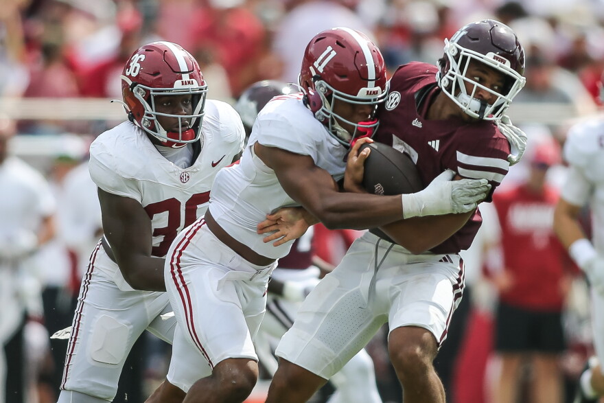 Alabama linebacker Xavier Griffin (11) makes a tackle against Mississippi State running back Xavier Gayten during the second half of an NCAA college football game in Starkville, Miss., Saturday, Oct. 3, 2026. (AP Photo/James Pugh)
