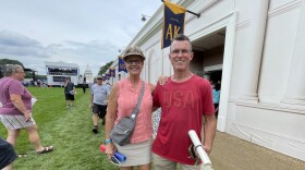 couple in front of AK banner