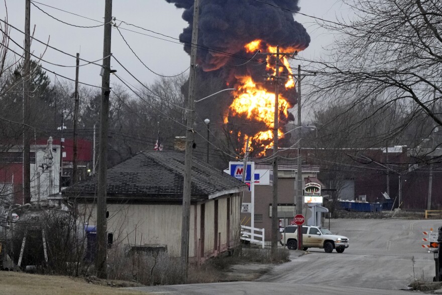 A black plume and fireball rise over East Palestine, Ohio, as a result of a controlled detonation of a portion of the derailed Norfolk Southern trains Monday, Feb. 6, 2023.