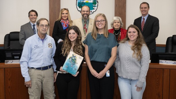 Asher Guillory with her Keep Florida Beautiful Youth Champion award at the Okaloosa County Commissioners' meeting, Dec. 9.