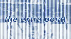The Extra Point. A digitally altered image of a frame of the 1998 UK vs Duke game. Blue and white alternating lines give the vaguest outline of the players.