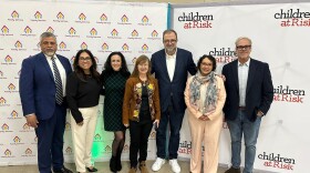 Local and national leaders speaking at the Family Neighborhood Place Community Center