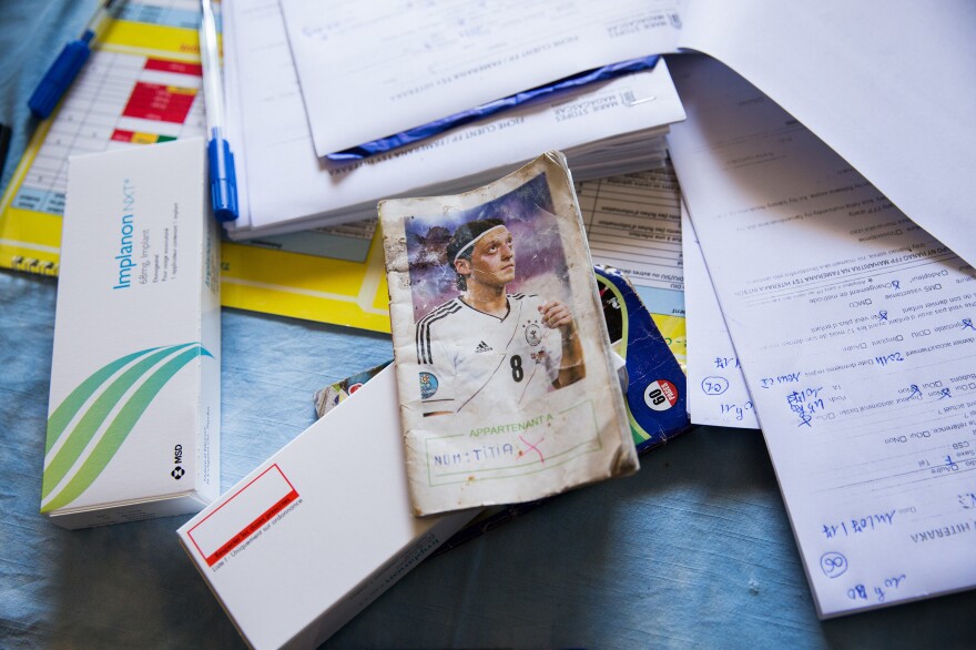In eastern Madagascar people record their medical information in inexpensive notebooks adorned with European soccer stars. At the mobile clinic, the nurses write the women's vital signs in the ledgers and the replacement date for contraceptive implants.
