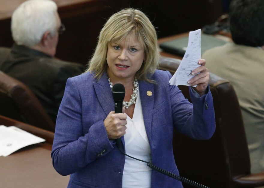 Oklahoma state Rep. Leslie Osborn, R-Mustang, debates a budget bill on the House floor in Oklahoma City on Feb. 12, 2018. "Without new recurring revenue, we can't fix these problems," said Osborn, who was ousted as chairwoman of the powerful House Appropriations and Budget committee for her outspoken support of tax increases. (Sue Ogrocki/AP)