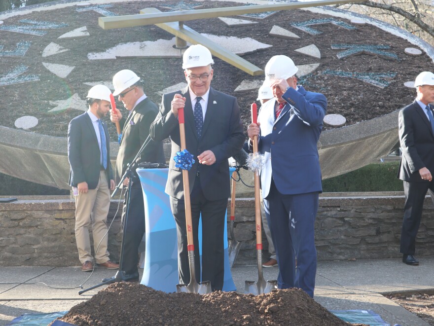 GOP Sen. Robby Mills, the co-chair of the Kentucky Housing Task Force, takes up his shovel for a staged groundbreaking in front of the floral clock at the Kentucky State Capitol after Republican lawmakers discussed their plans to address affordable housing needs in the state.
