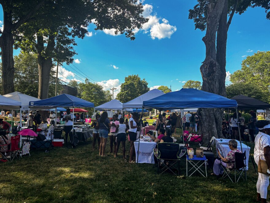 Hundreds of attendees browse vendor tents during Norwalk’s fifth annual Juneteenth Celebration at the Norwalk Green on Saturday, June 13, 2026. The event featured local businesses, community organizations, food vendors and cultural programming commemorating Juneteenth.