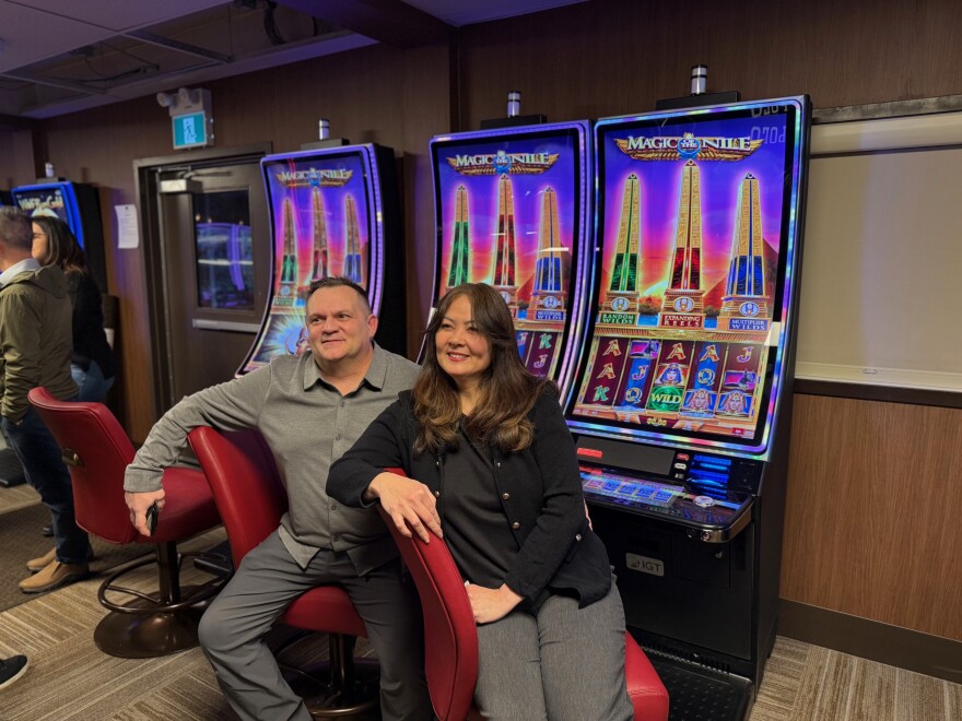 Don and Robin Amadon, the first patrons to play the electronic gaming machines aat the Chin'nan Gaming Hall.