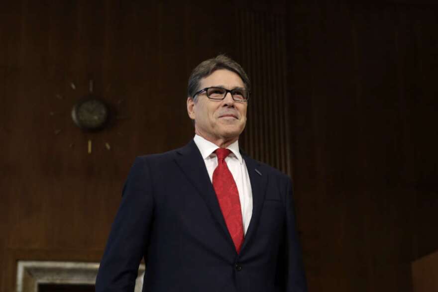 Former Texas Gov. Rick Perry takes a seat before the Senate Energy and Natural Resources Committee hearing on his nomination to be energy secretary on Jan. 19, 2017. CREDIT: Yuri Gripas/AFP/Getty Images