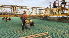 Construction takes place in 2018 on an Interstate 405/State Route 167 interchange project. (Washington State Department of Transportation)