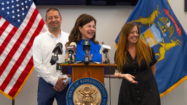 Kristen McDonald-Rivet (D-Bay Citys is joined by Chelsea Fitzgerald of Saginaw and Justin Pommerville with UA Local 85, as she holds a press conference for a recently introduced anti-corruption bill in Saginaw, Michigan, on Friday, July 10, 2026.