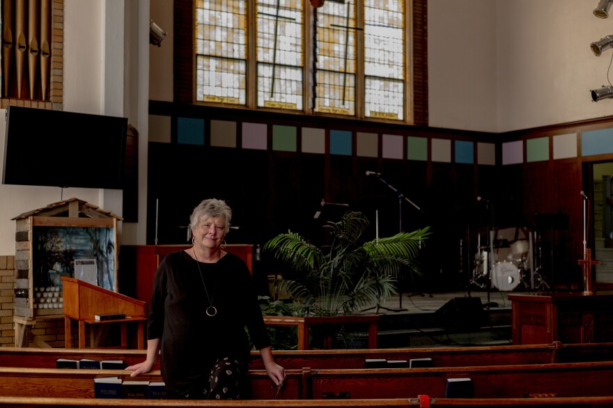 Executive Pastor Pam Pangborn stands inside Hope Community Church in Detroit. The church had installed five back-flow valves to prevent flooding but the force of the water on June 26 overwhelmed them and flooded the church basement.