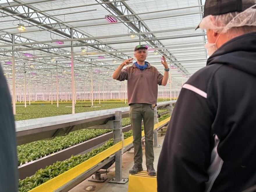 Jack Daley, center, explains the workings of the warehouse during an April 2025 tour of North Country Growers in Berlin. Daley is a project manager and engineering analyst for American Ag Energy, based in Cambridge, Mass.