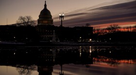 The U.S. Capitol just before sunrise Thursday, Jan. 6, 2022, in Washington on the one year anniversary of the attack on the U.S. Capitol.