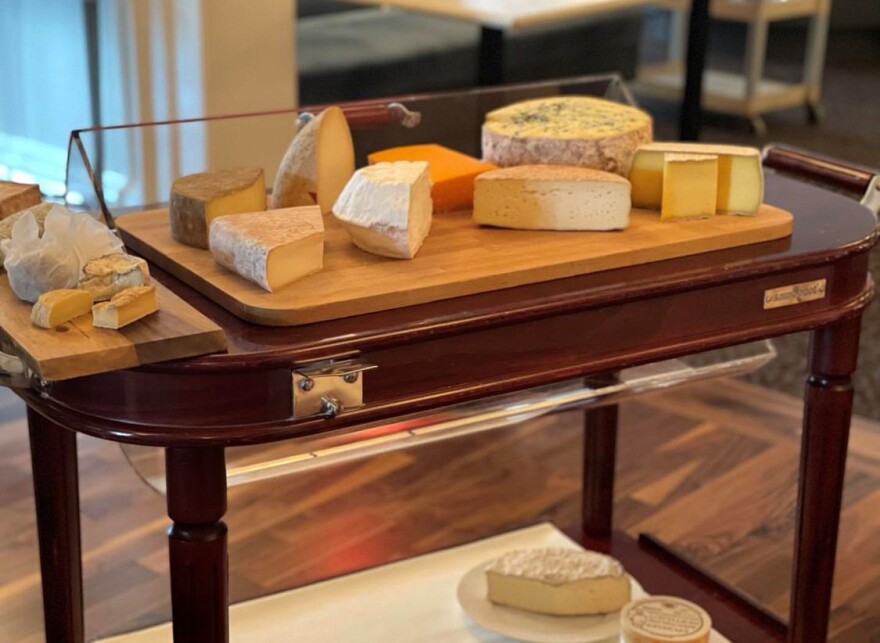 Cheese cart with a variety of cheeses - Credit: @chefwolf/Instagram