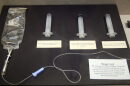 In this April 5, 2017 photo, an exhibit at the Texas Prison Museum shows the three-chemical mixture used by Texas prison officials for lethal injections in the state from 1982 until 2012, when it was replaced by a single drug. Tennessee was using a three-drug protocol when an independent investigation found the state was mishandling its lethal injection program. Like Texas, Tennessee is pivoting to a single-drug process.
