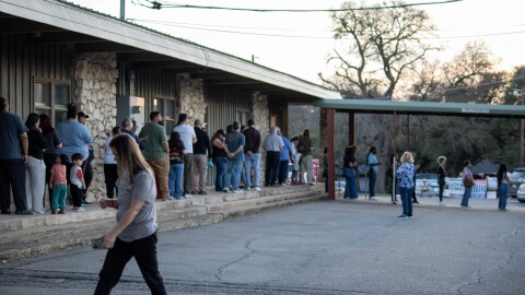 Voters stand in line outside the voting center at Waco First Assembly of God Church on Tuesday, March 3, 2026.