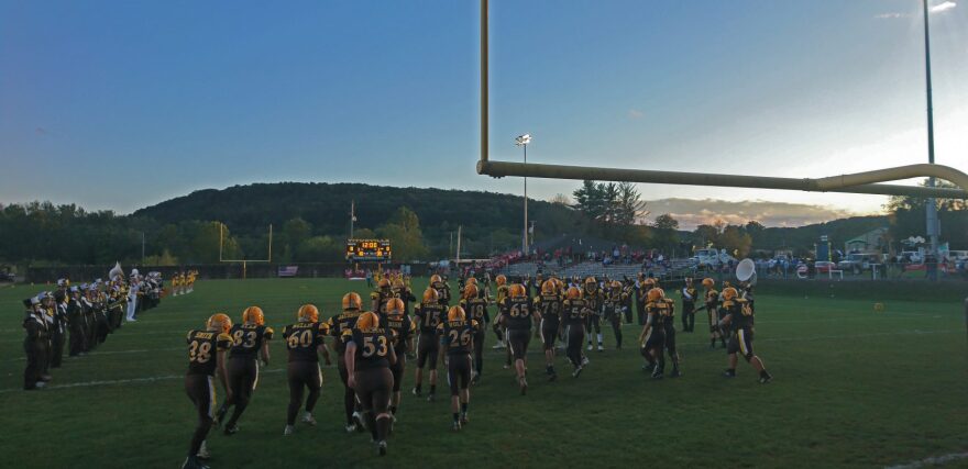 The Titusville football team takes the field for the 2017 homecoming game" title="(Kevin McCorry/WHYY)