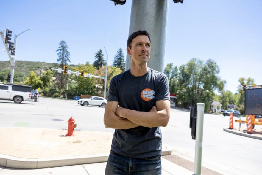 Andrew Allport, Bike Durango co-director, stands at the intersection of West Park and Main Street, where his son was hit by a car a few years ago, Sept. 4, 2024, in Durango. “I’m a parent. I try to work on pedestrian safety, particularly for kids,” Allport said.