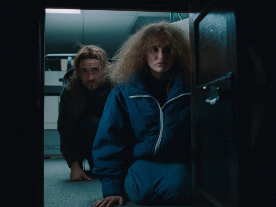 John Cusack and Cameron Diaz in <em>Being John Malkovich</em>.