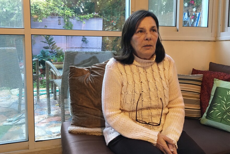 Daphna Eilon in her Tel Aviv apartment in January. She left Jerusalem because as a secular Jew, she felt pushed out. "Slowly but surely, we feel unwanted, unwelcome, un-everything," she said.