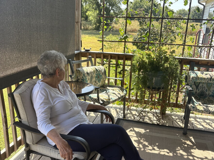 JaNelle Rutledge looks out over her home near Slaughterville.
