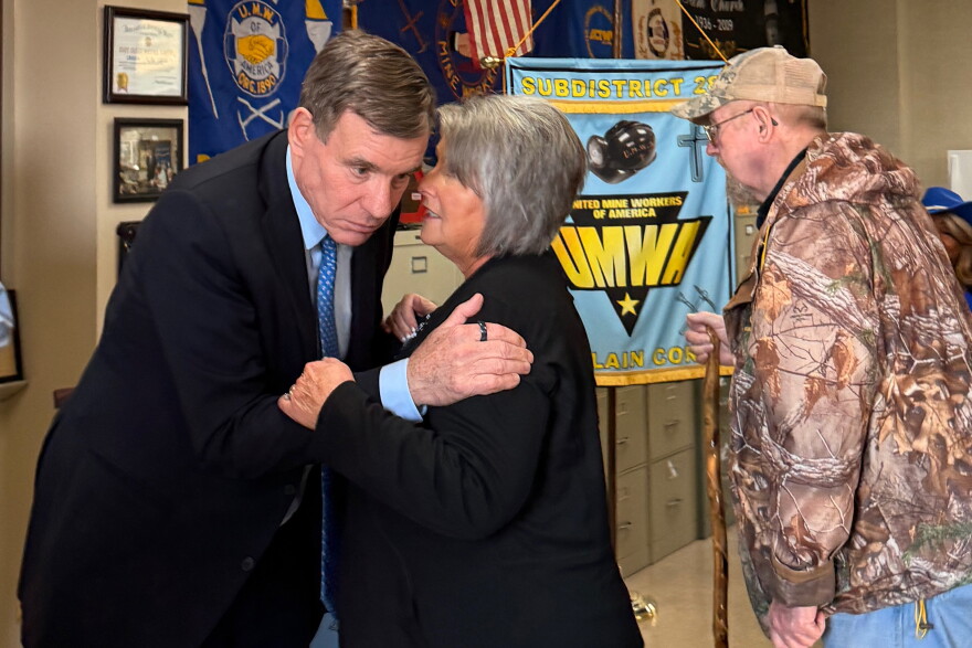 The day before announcing his reelection campaign in March, U.S. Sen. Mark Warner, D-Virginia, meets with Vonda Robinson, president of the National Black Lung Association as well as United Mine Workers of America representatives, healthcare workers, lawyers and miners at the UMWA office in Castlewood, Virginia.