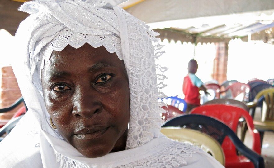 Hadja Bintou Conte, a mother-of-five who dyes textiles for her living, tells her neighbors that Ebola is definitely real. But they're not always ready to agree.<strong> </strong>