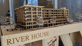 A model of River House on display during the celebration.