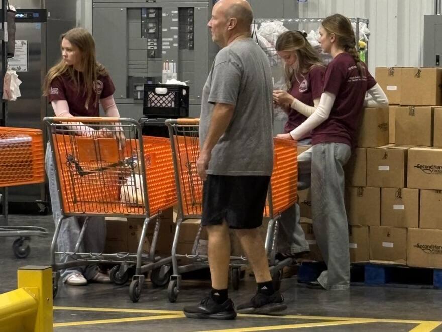 Student volunteers help out at Lake Cares.